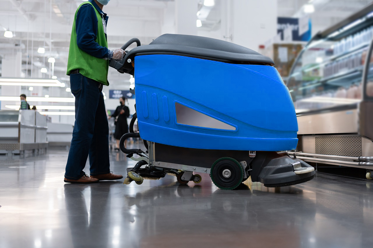 cleaning floor with machine